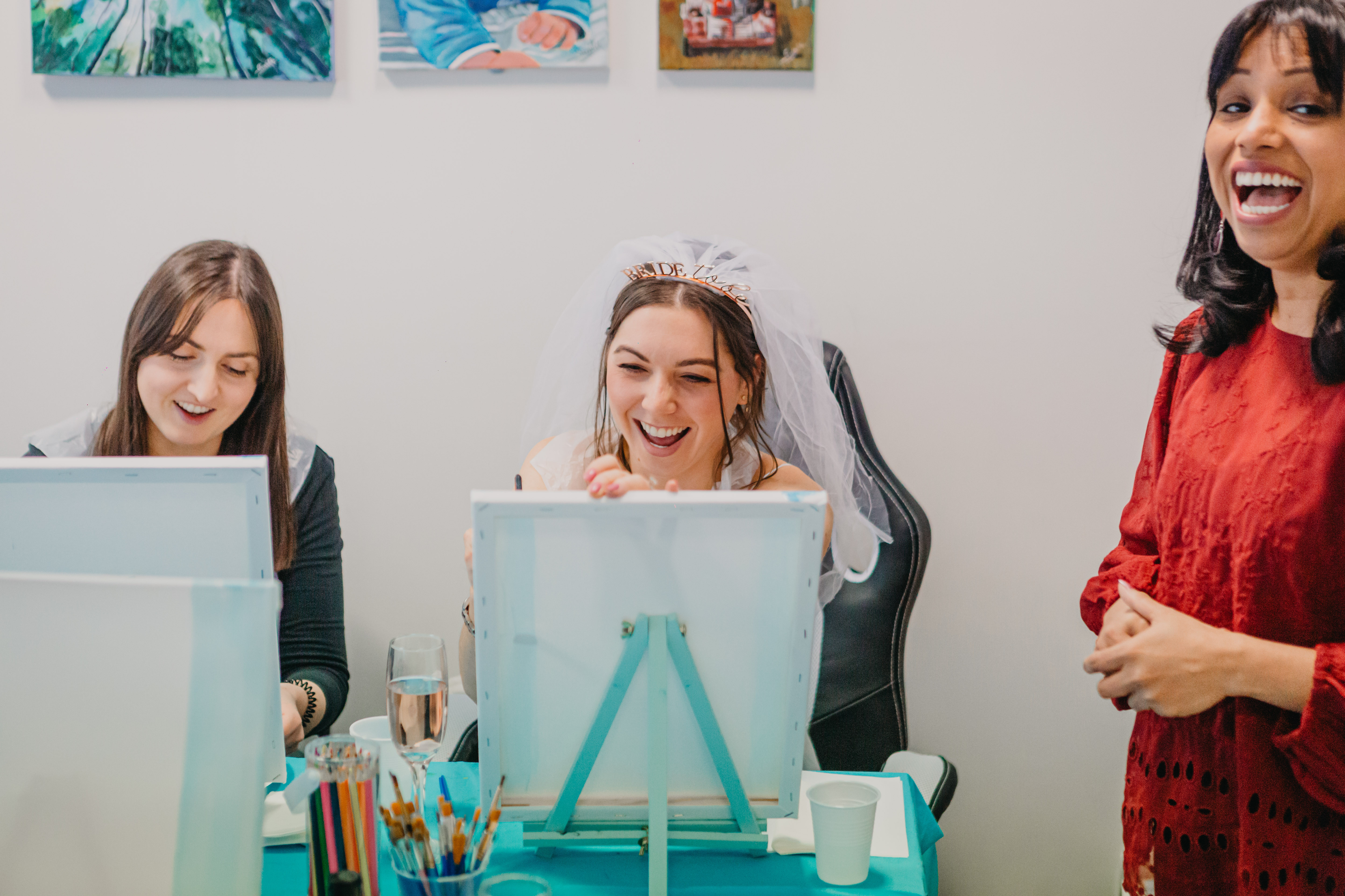 A bride to be at a hen party drawing class